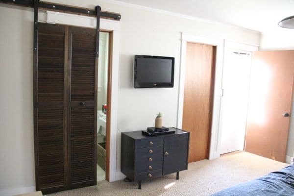 Modern DIY Barn Door Hardware in Master Bedroom