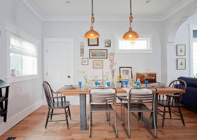 Metal and Wood Table with Black Chairs
