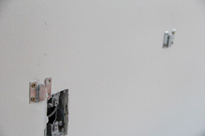 How to Wall Mount a Headboard with Space for Curtains
