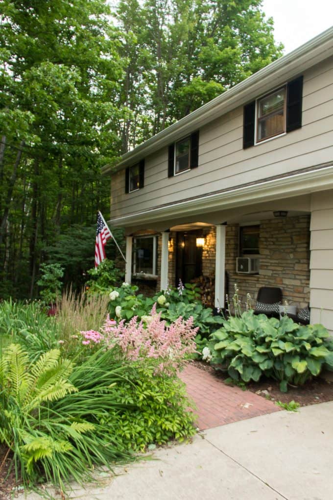 Black Shutters on Tan House