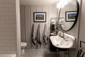 Board and Batten Bathroom with a Farmhouse Sink